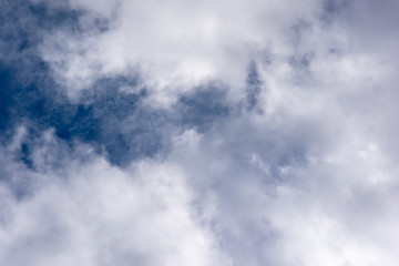 Obraz premium blue sky background with tiny clouds