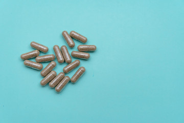 kelp capsules on a blue background