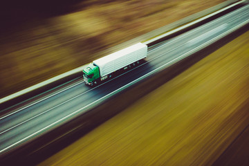 White green truck speed transport goods highway street motorway - obrazy, fototapety, plakaty