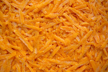 grated fresh carrot for texture or background, raw ingredient for salads