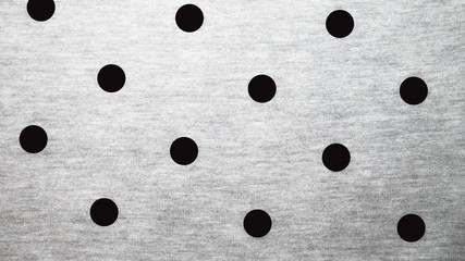 gray background with black spots