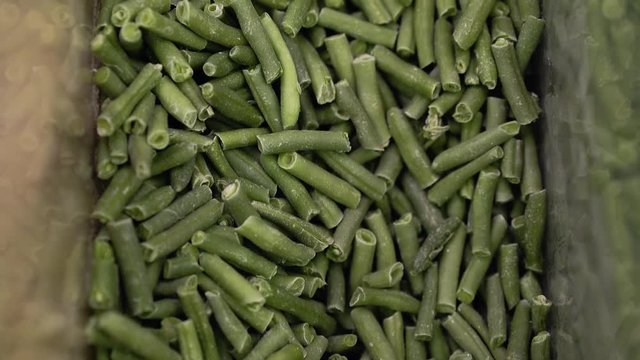 String beans in a storefront in a supermarket. Close up.