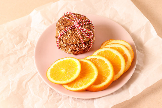 Oatmeal cookies, orange slices. Concept for a tasty and healthy snack. 