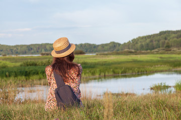 Obraz premium Young beautiful girl enjoy fascinating landscape