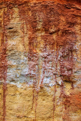 Stones texture and red, yellow, brown background. Rock texture