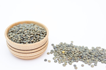Green lentils isolated on white background