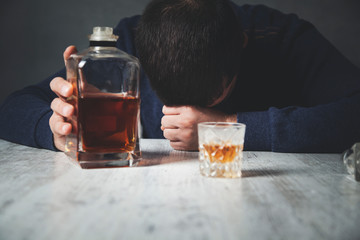 sad man hand  whiskey