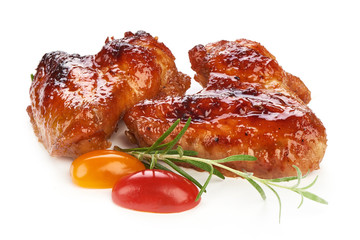 Roasted Buffalo chicken wings with barbecue sauce, american food, close-up, isolated on white background