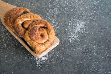 traditional Dutch cinnamon, sugar bread in a roll, called Zeeuwse Bolus