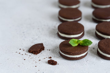 Homemade chocolate sandwich cookies with vanilla cream 