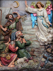 Fototapeta na wymiar Angel of the Lord visited the shepherds and informed them of Jesus' birth, altarpiece in the church of Saint Matthew in Stitar, Croatia