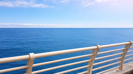 Fototapeta na wymiar POV of tourist walking on cruise upper deck, clean blue sea, ecology concept