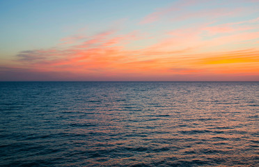 Naklejka na ściany i meble Sunset in the sea