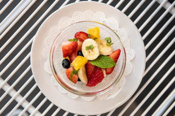 Fruit salad on a small bowl