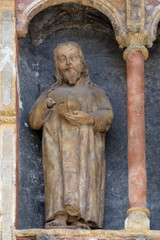 Statue of saint on the south portal of the church of St. Mark in Zagreb, Croatia 