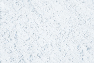 Fresh snow background texture. Winter background with snowflakes and snow mounds. Snow lumps.