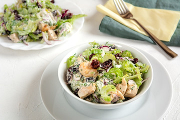 Salad with celery, chicken, cranberry, red onion, dill and yogurt.