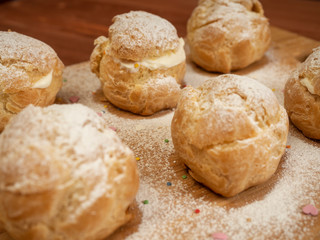 Naklejka premium Delicious tender profiteroles