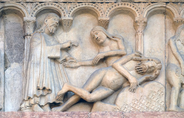 Plate with stories from Genesis: Creation Of Eve relief by Wiligelmo, Modena Cathedral, Italy 