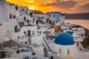 Santorini greece famous Oia in sunset time golden hour 
