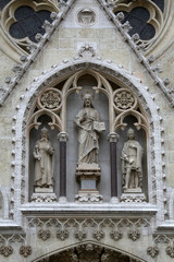 Fototapeta na wymiar Jesus Christ surrounded by saints Stephen the King and St. Ladislaus, portal of the cathedral in Zagreb, Croatia