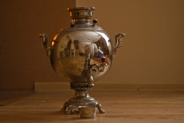 Chrome plated vintage Samovar with Cup on wood flow