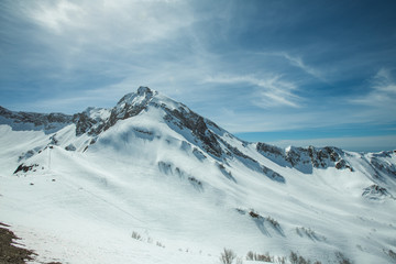 Obraz premium A ski slope in the mountains of the ski resort of Rosa Khutor. Sochi, Krasnaya Polyana, Krasnodar Territory, Russia