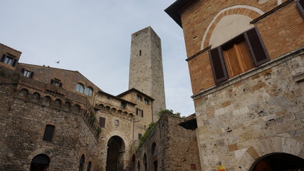 Naklejka premium Picturesque View of Towers in San Gimignano at sunset, Tuscany, Italy