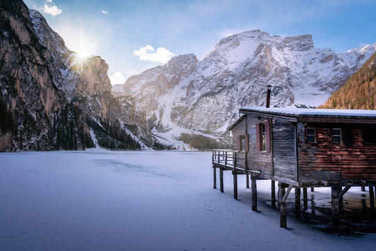 Amazing nature Landscape, Braies Lake in the Dolomites mountains, Italy.  lake braies frozen during winter. sunlight over the dolomites mountains