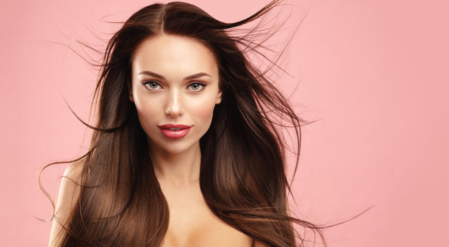 Volume Brown hair model face portrait. Elegant attractive woman with  perfect skin and natural make up against pink background. Beauty salon and  cosmetics concept. Banner with copy space. Stock Photo | Adobe