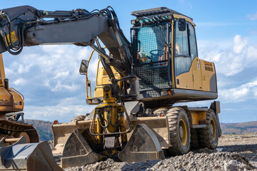 excavator - construction site with heavy machines