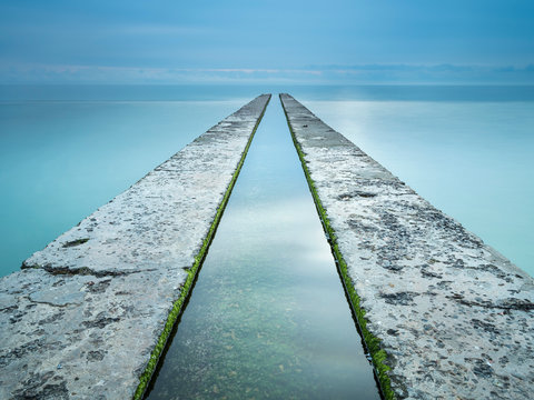 old pier with water canal