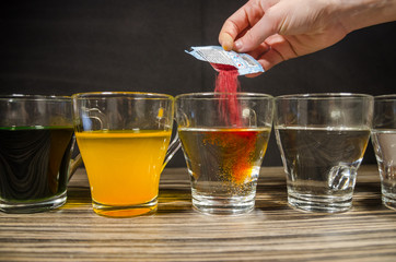 cups with colored water for easter