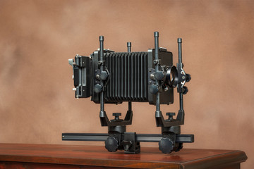 4x5 View Camera From Side On Brown With Copy Space