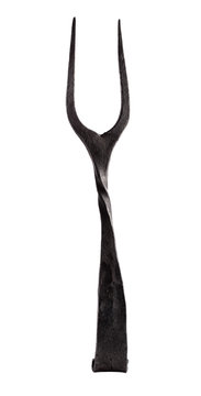 Forged black vintage fork isolated on white