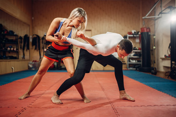 Woman makes elbow kick, self-defense workout © Nomad_Soul