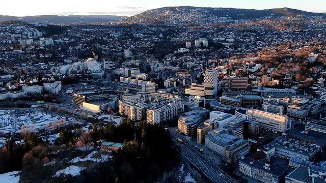Aerial short clockwise timelapse shot of Skoyen urban area towards Holmenkollen in Oslo, Norway