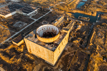 Aerial top view of abandoned and ruined Nuclear Power Plant in Shelkino, Crimea. Large USSR...