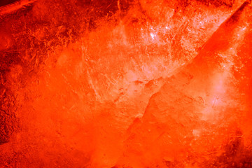 Hell fire. Red-orange abstract background evoking hot hell cave or volcano magma rocks.