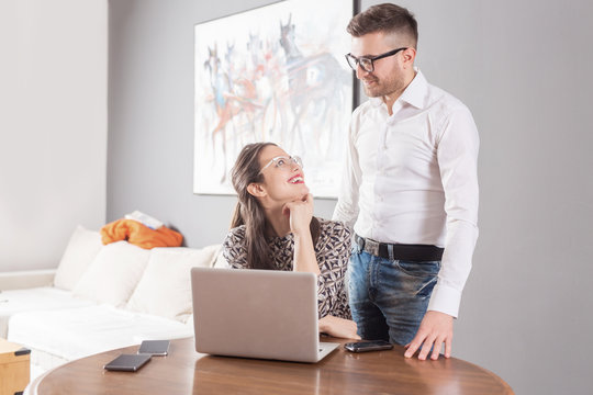 Young business married couple  in apartment