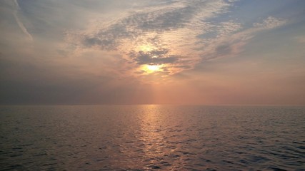 A beautiful sunset at sea in Peel, Isle of Man