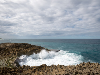 Huge waves collide against a reef near Jobos Beach in Puerto Rico, USA.
