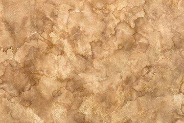 Aged stained brown textured abstract paper background
