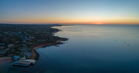 Mount Eliza coastline and Canadian Bay yacht club at sunset. Aerial panorama with copy space