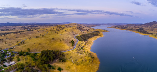 Australian countryside and lake at dusk - aerial panorama