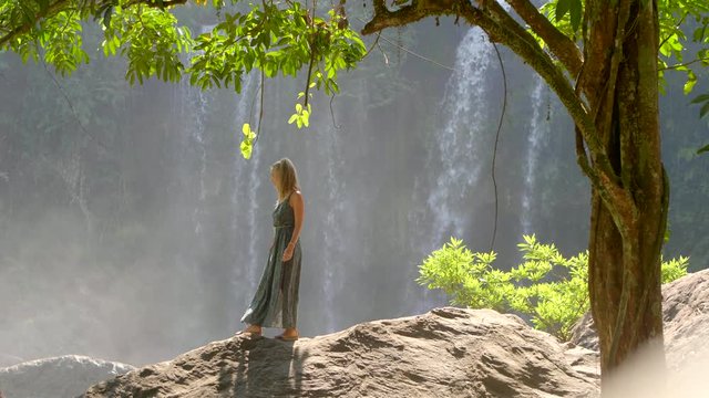 Woman By Waterfall