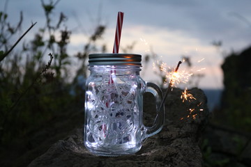 Jar with lights and sparkles 