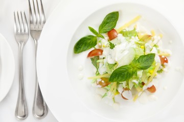 Bon appetit. Top view of a salad served in a restaurant