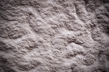 wall with white textured paint. vignette, background, exterior.