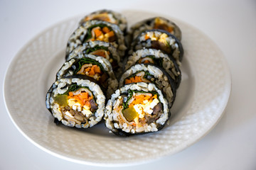 Kimbap filled with vegetables, egg and eanchovy